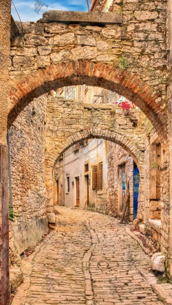 Paved alley in the historic village of Labin, a secret treasure located on the South East coast of Istria in Croatia.